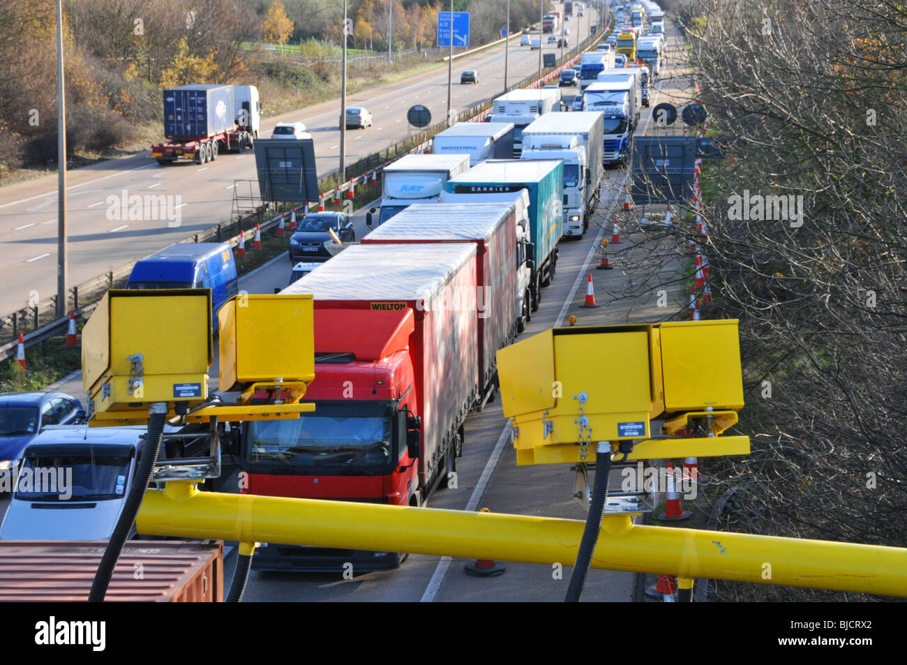 M25 Motorway average speed cameras and traffic jam Stock Photo