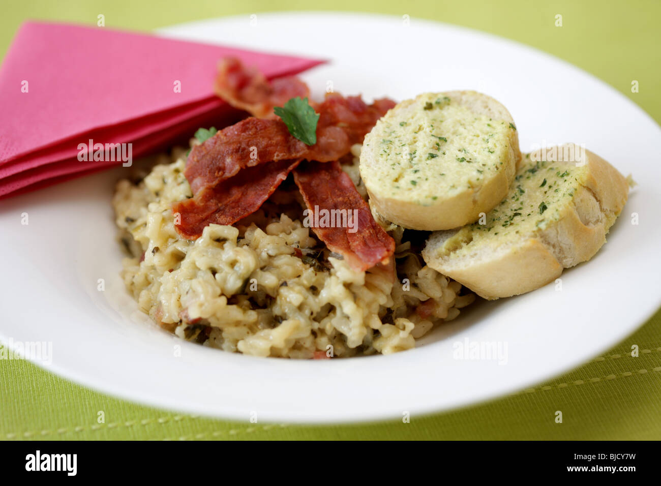 Pancetta Pamesan Risotto with Garlic Bread Stock Photo Alamy