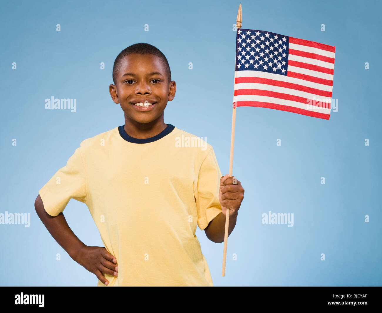 Child with American flag. Stock Photo