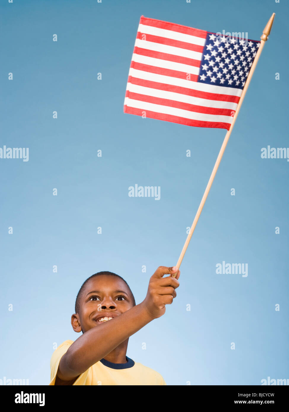 Child with American flag. Stock Photo