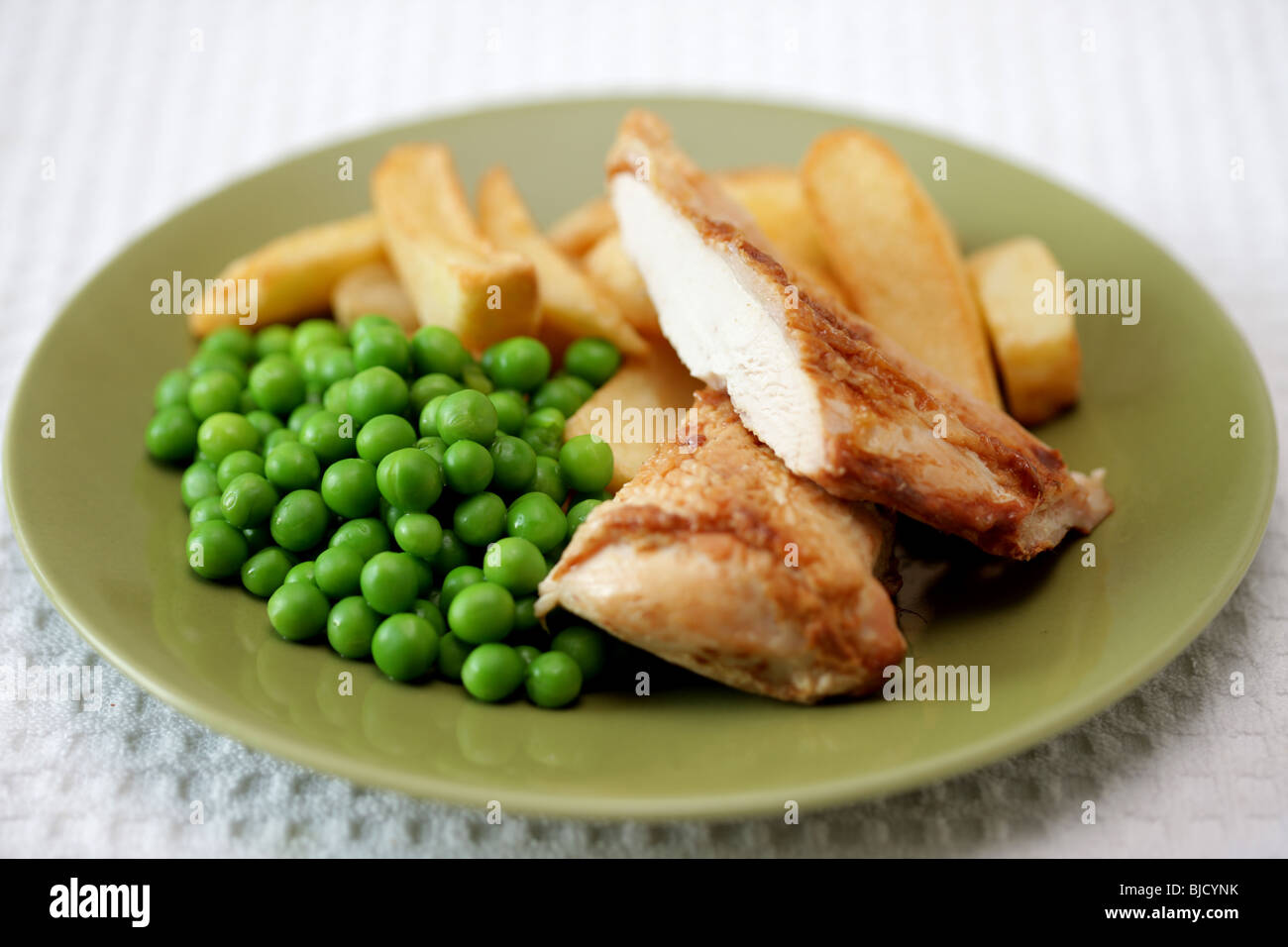 Chicken Chips And Peas Stock Photo Alamy