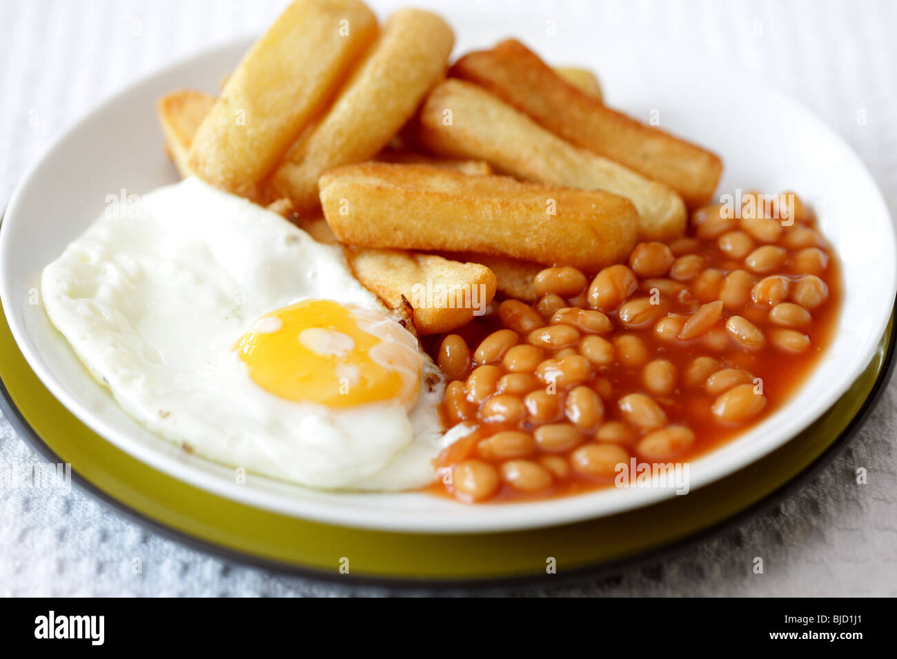 Fried Egg Baked Beans and Chips Stock Photo Alamy
