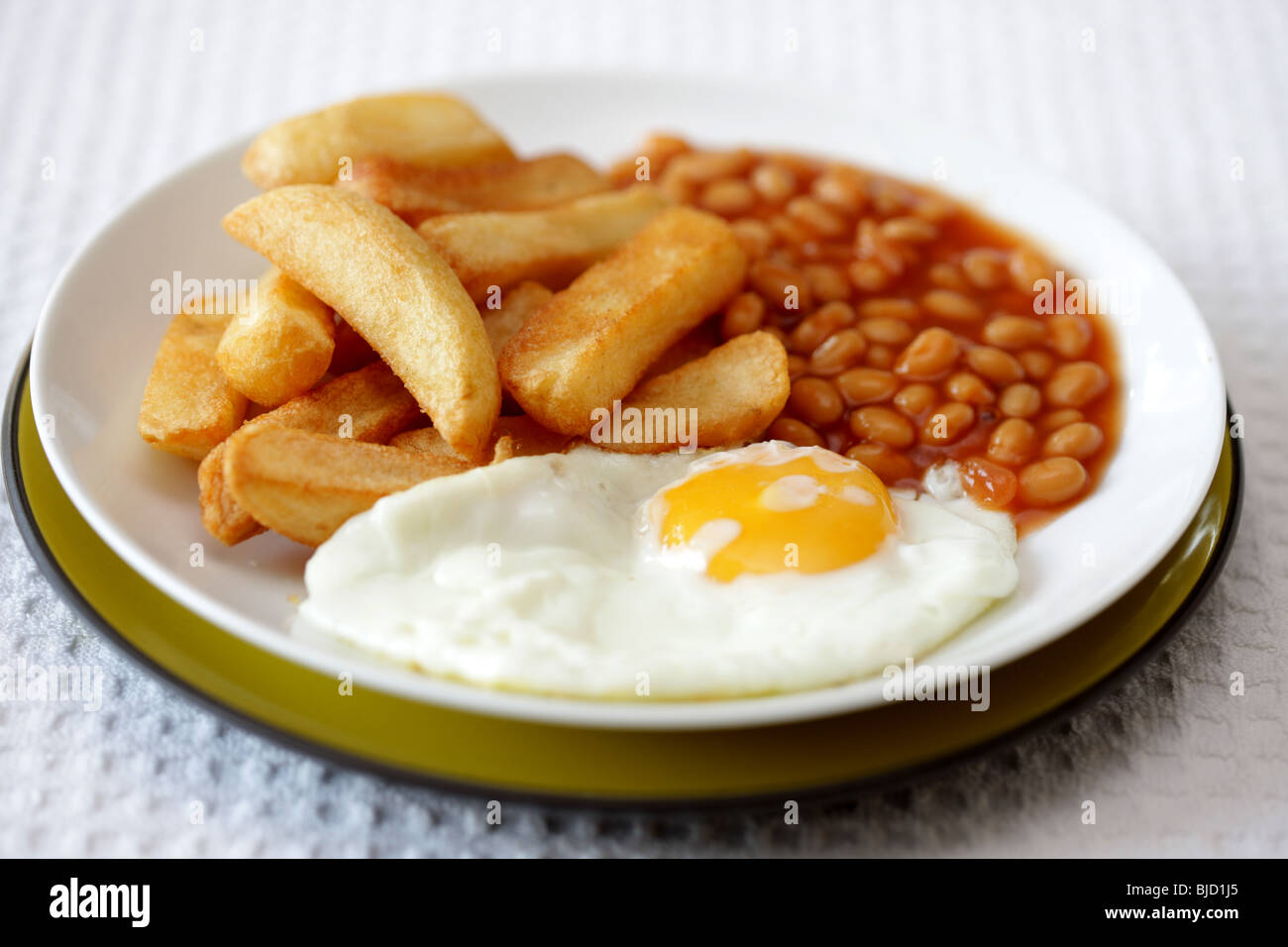 Fried Egg Baked Beans and Chips Stock Photo Alamy