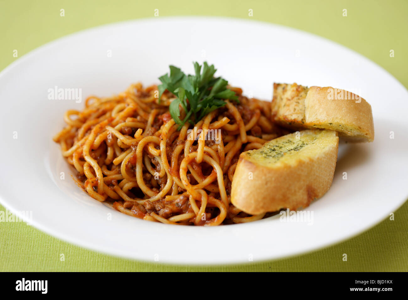 Spaghetti Bolognese with Garlic Bread Stock Photo Alamy