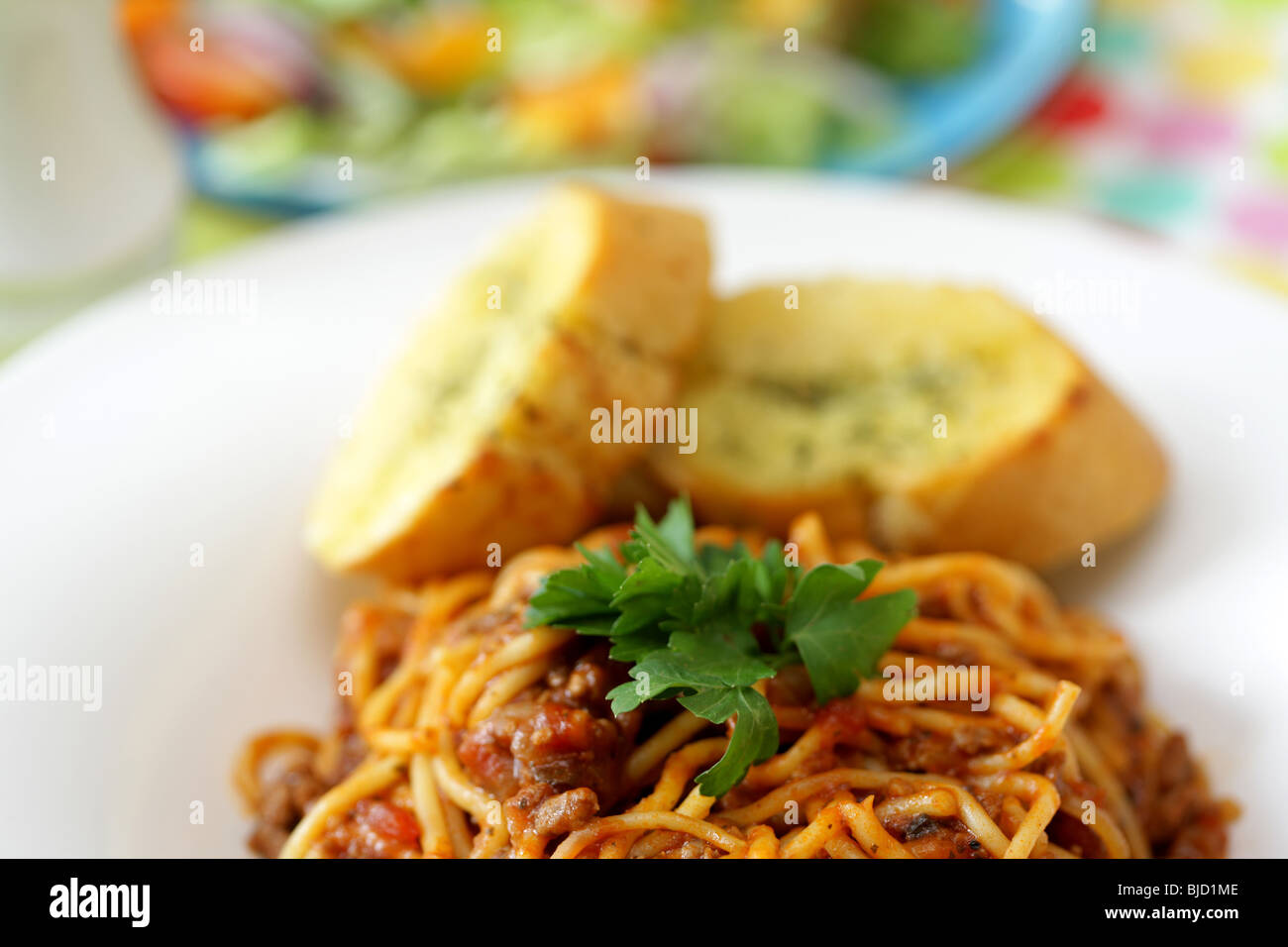 Spaghetti Bolognese with Garlic Bread Stock Photo Alamy