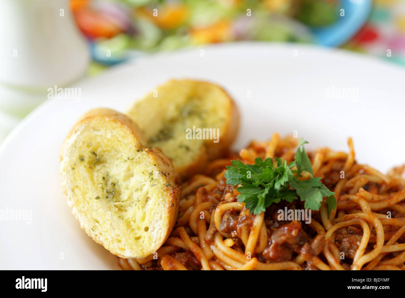 Spaghetti Bolognese with Garlic Bread Stock Photo Alamy