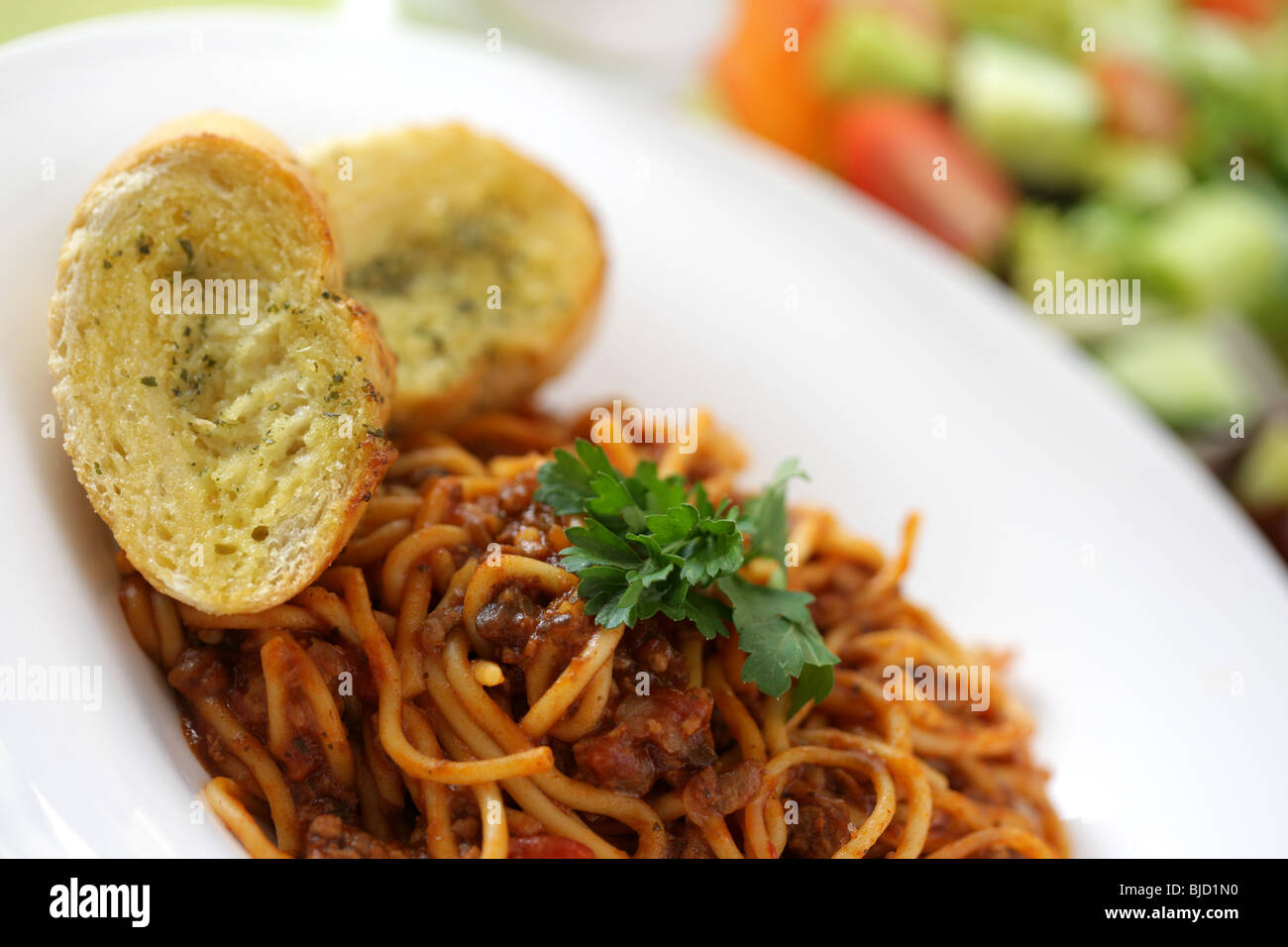 Spaghetti Bolognese with Garlic Bread Stock Photo Alamy