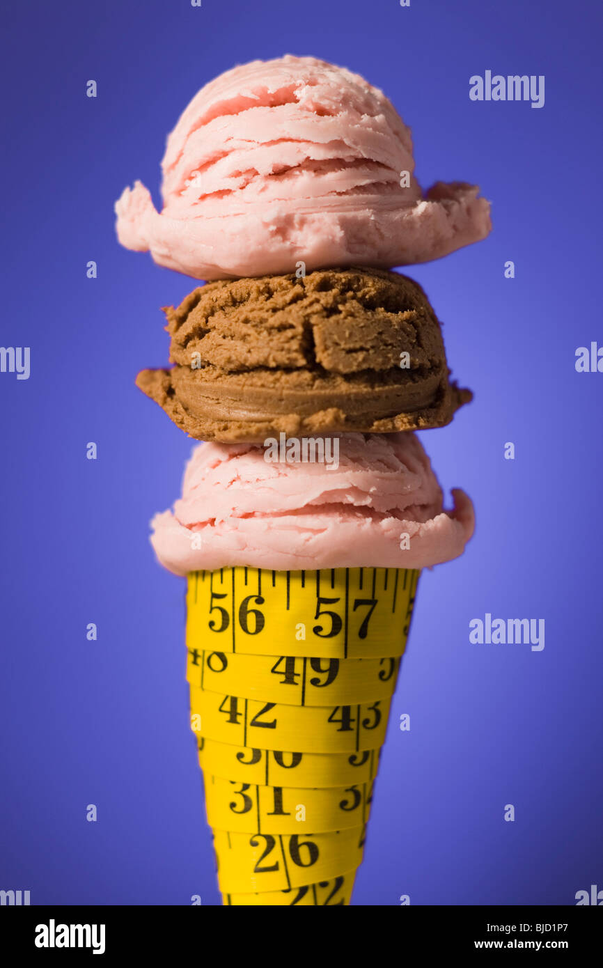 Ice cream cone made out of tape measure with 3 scoops of ice cream Stock Photo Alamy