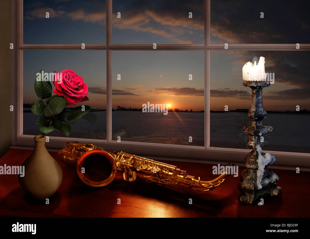 Red Roses And Saxophone red rose and saxophone on a window seal lighten by a candelabra Stock ...
