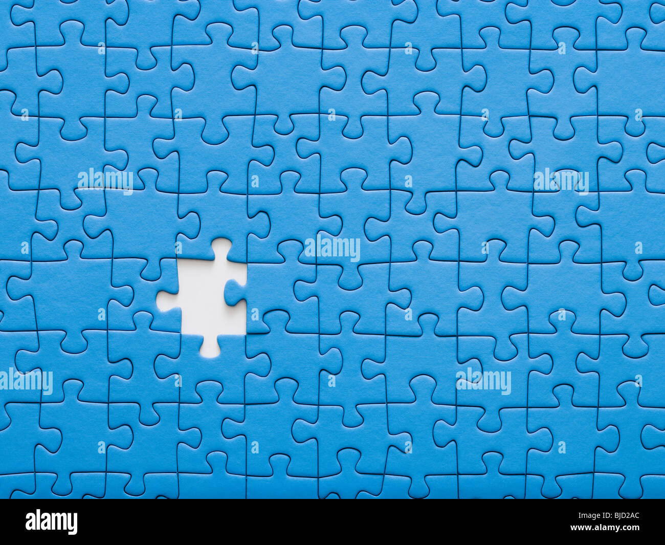 Jigsaw puzzle with a missing piece. Stock Photo
