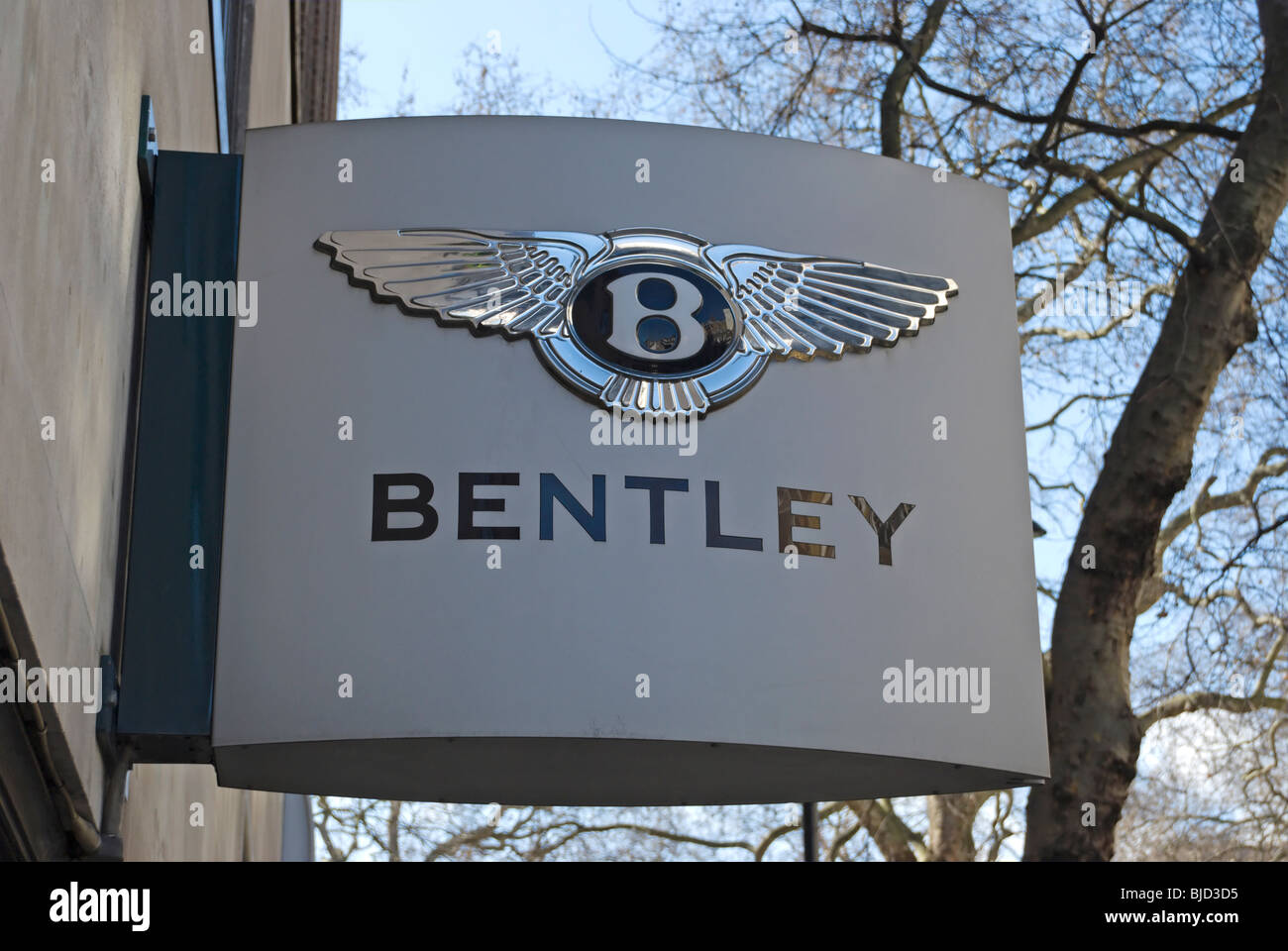 name and logo of bentley at a dealership of the prestige car company in berkeley square, mayfair, london, england Stock Photo