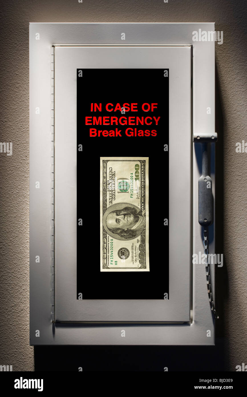 Fire alarm with money inside. Stock Photo