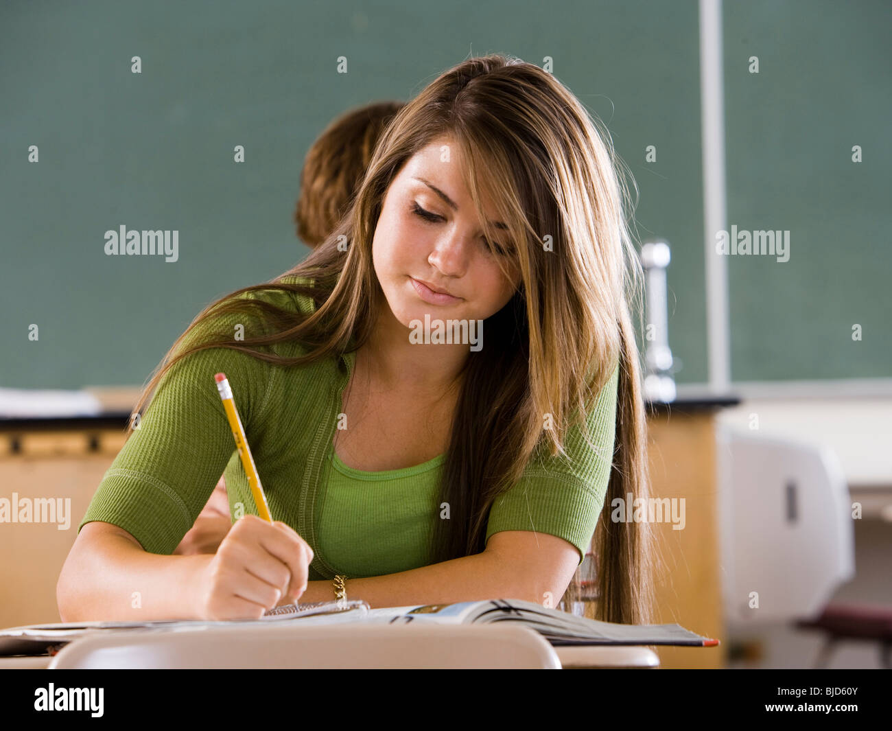 Student in a classroom Stock Photo - Alamy