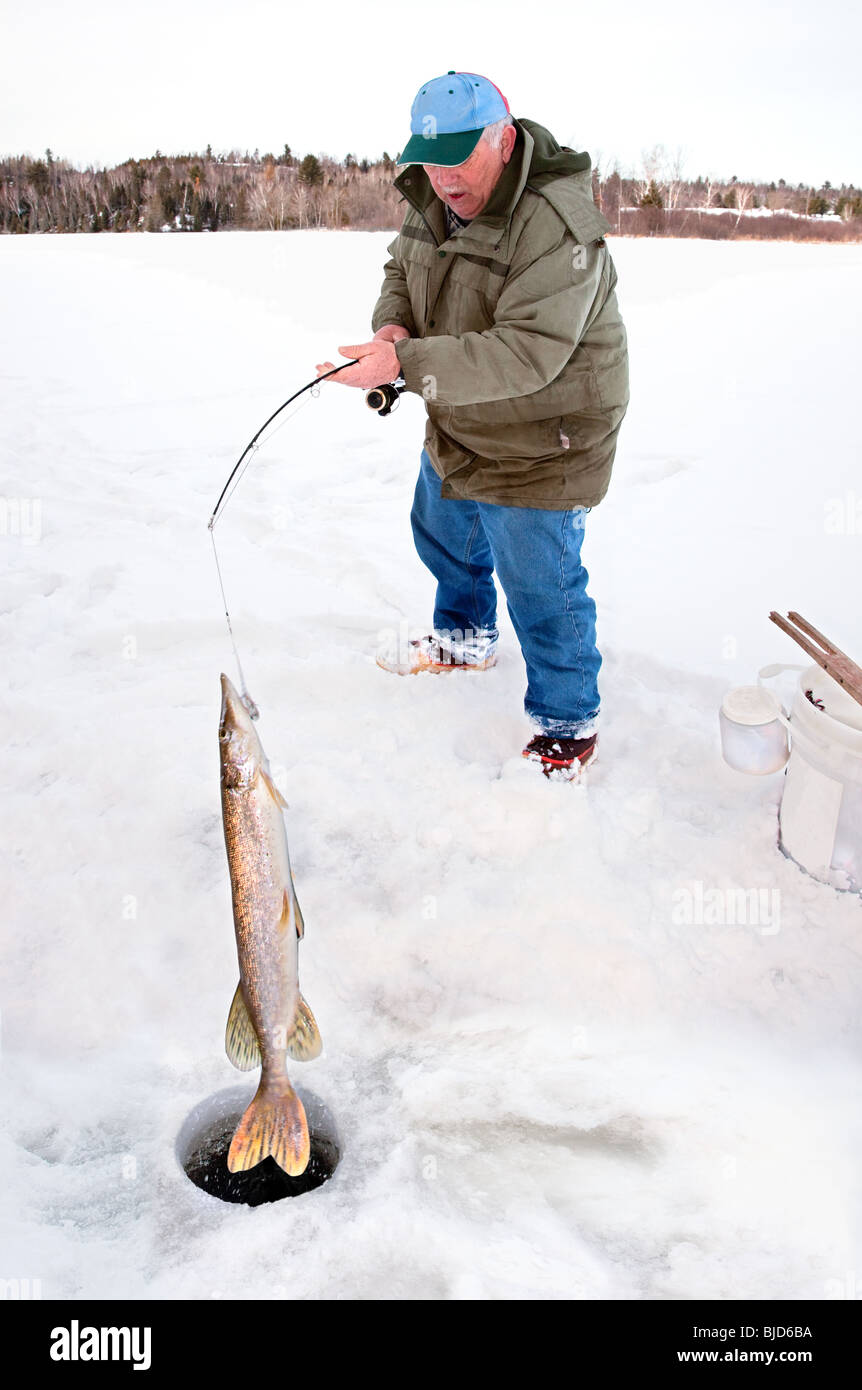 Man big pike ice fishing hi-res stock photography and images - Alamy