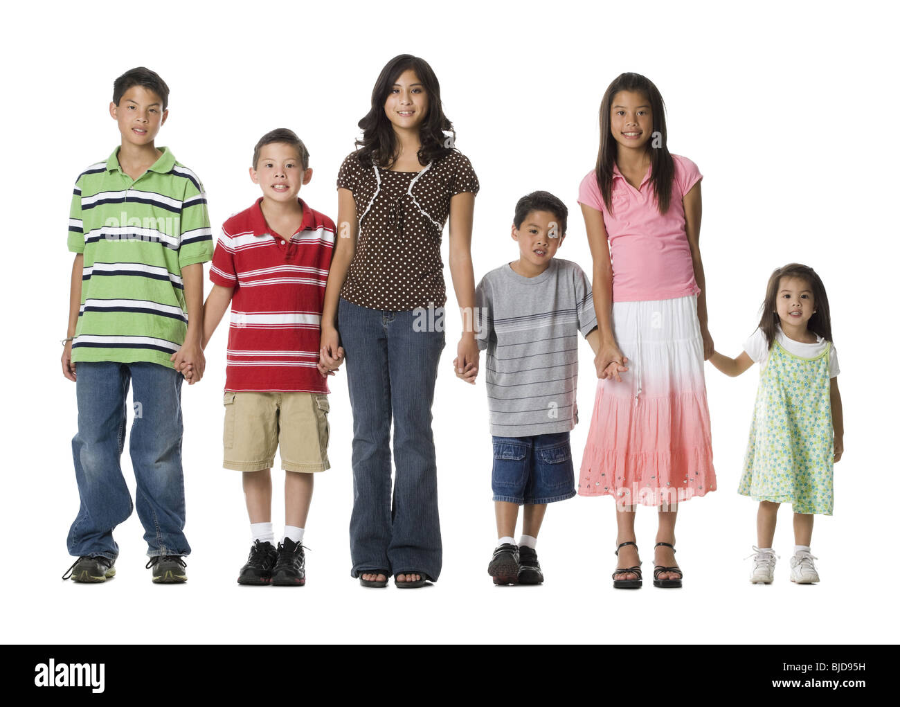 Family standing together Stock Photo Alamy