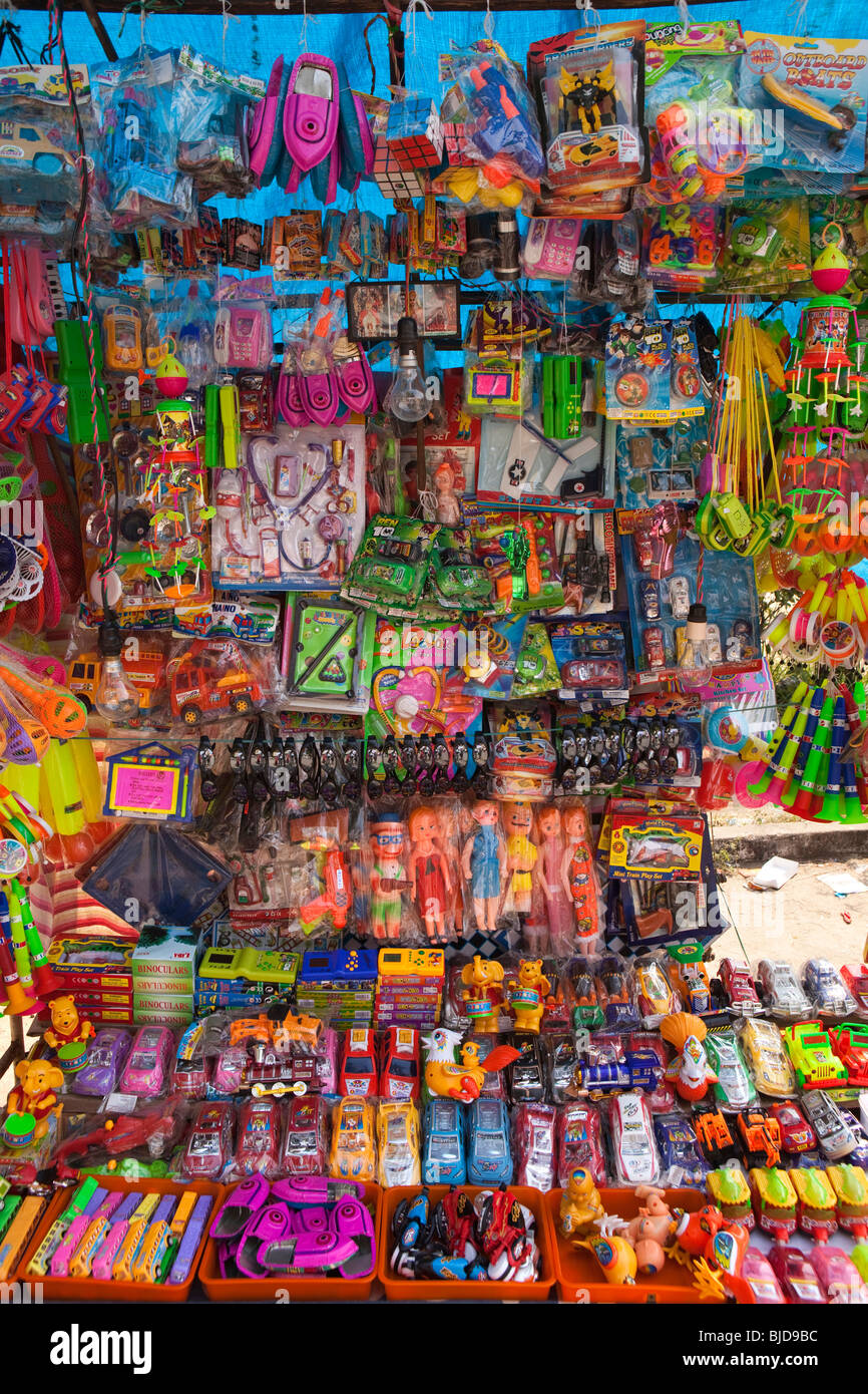 India, Kerala, Kochi, Ernakulam Shiva Temple, Uthsavom festival, colourful cheap plastic souvenir stall Stock Photo