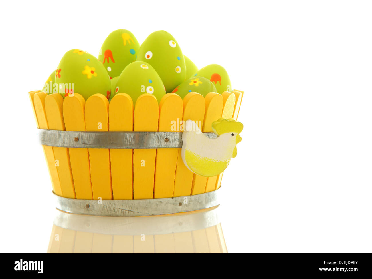 Easter eggs in the basket isolated on white background Stock Photo - Alamy