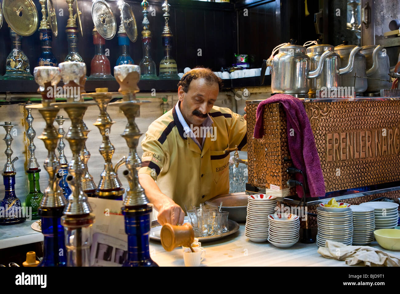 Making coffee, Turkish tea house, Hookah or water pipes on counter