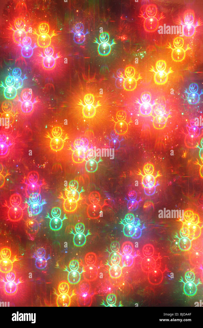 closeup of christmas tree with glowing snowman lighting effect Stock Photo