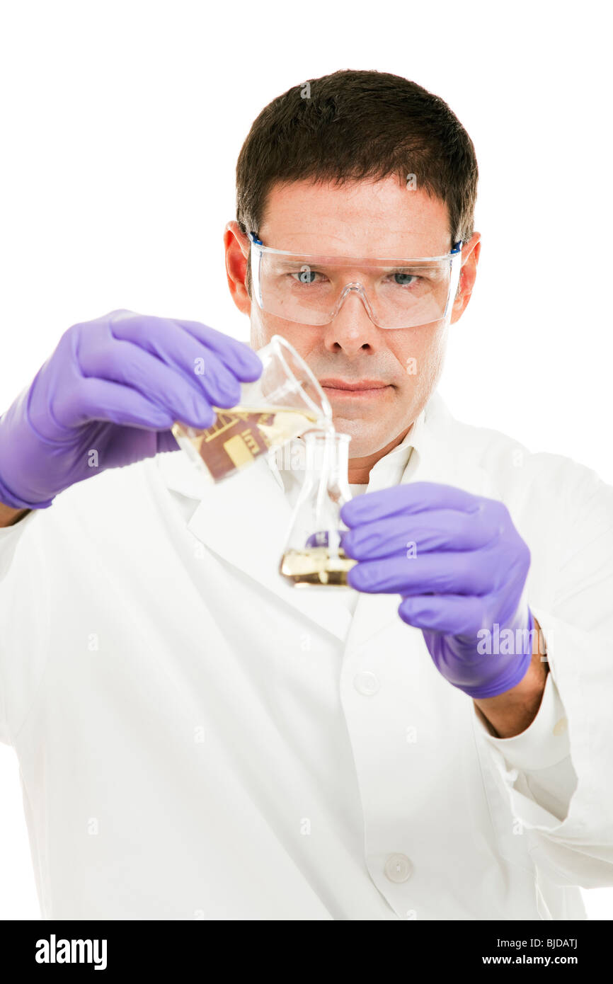 Chemist pours liquid from a beaker to a flask. Focus on the model's face Stock Photo Alamy