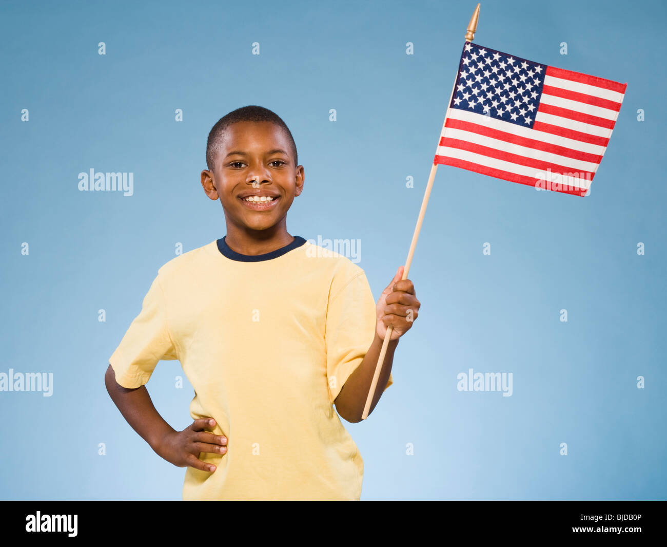 Child with American flag. Stock Photo