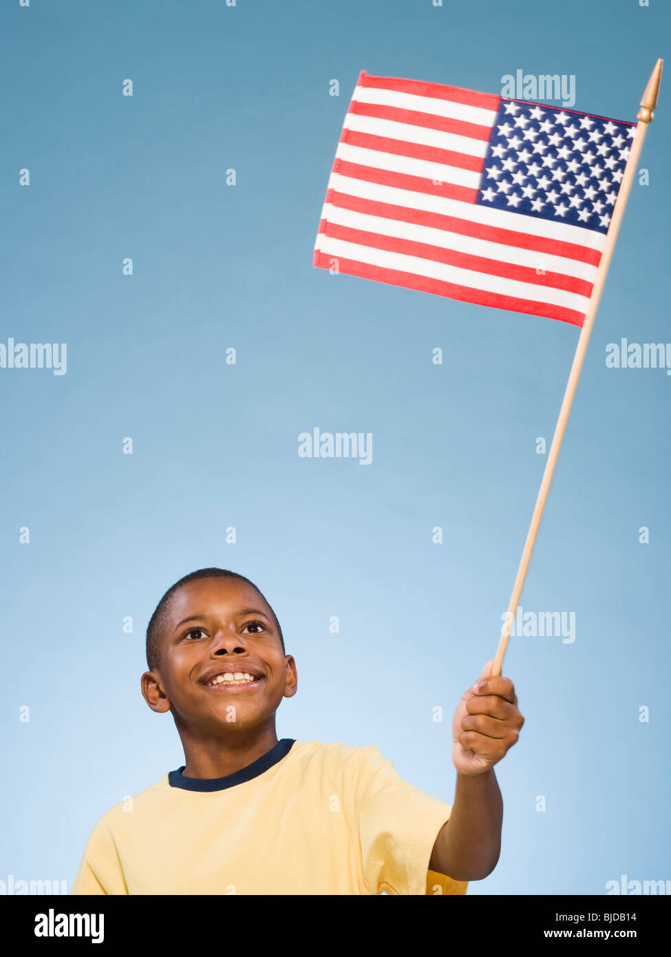 Child with American flag. Stock Photo