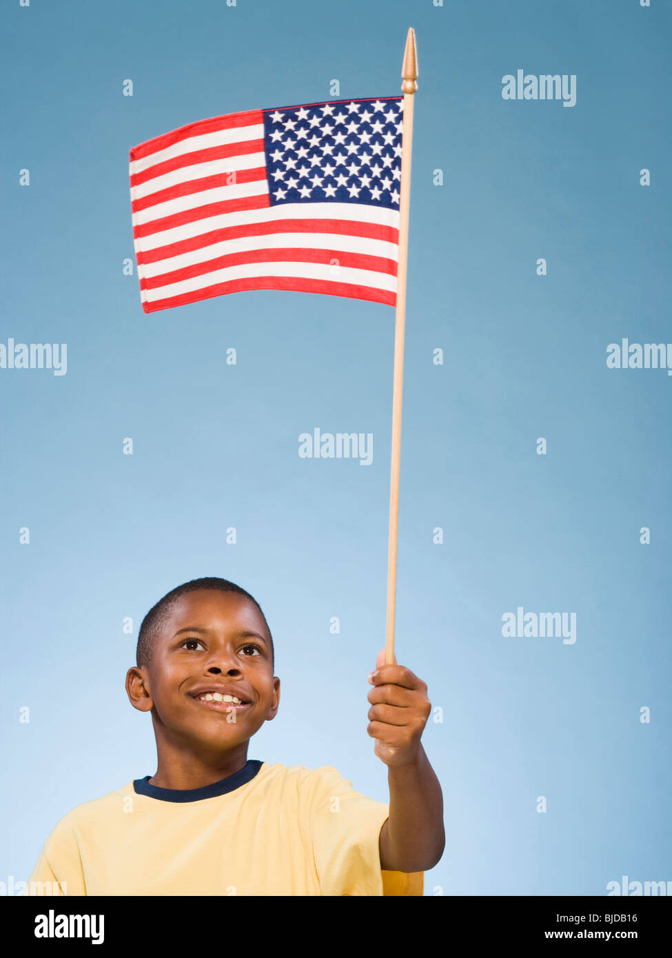 Child with American flag. Stock Photo