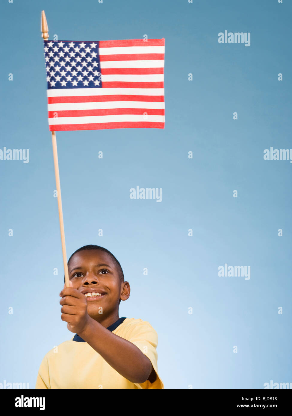 Child with American flag. Stock Photo