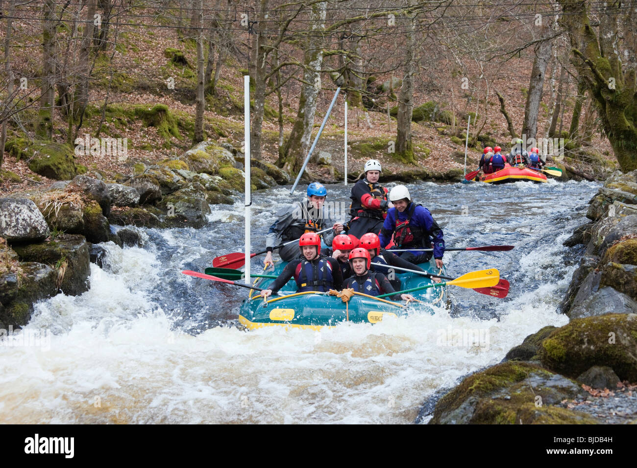 People having fun white water rafting on Tryweryn River. National Whitewater Centre, Frongoch, Gwynedd, North Wales, UK, Britain Stock Photo