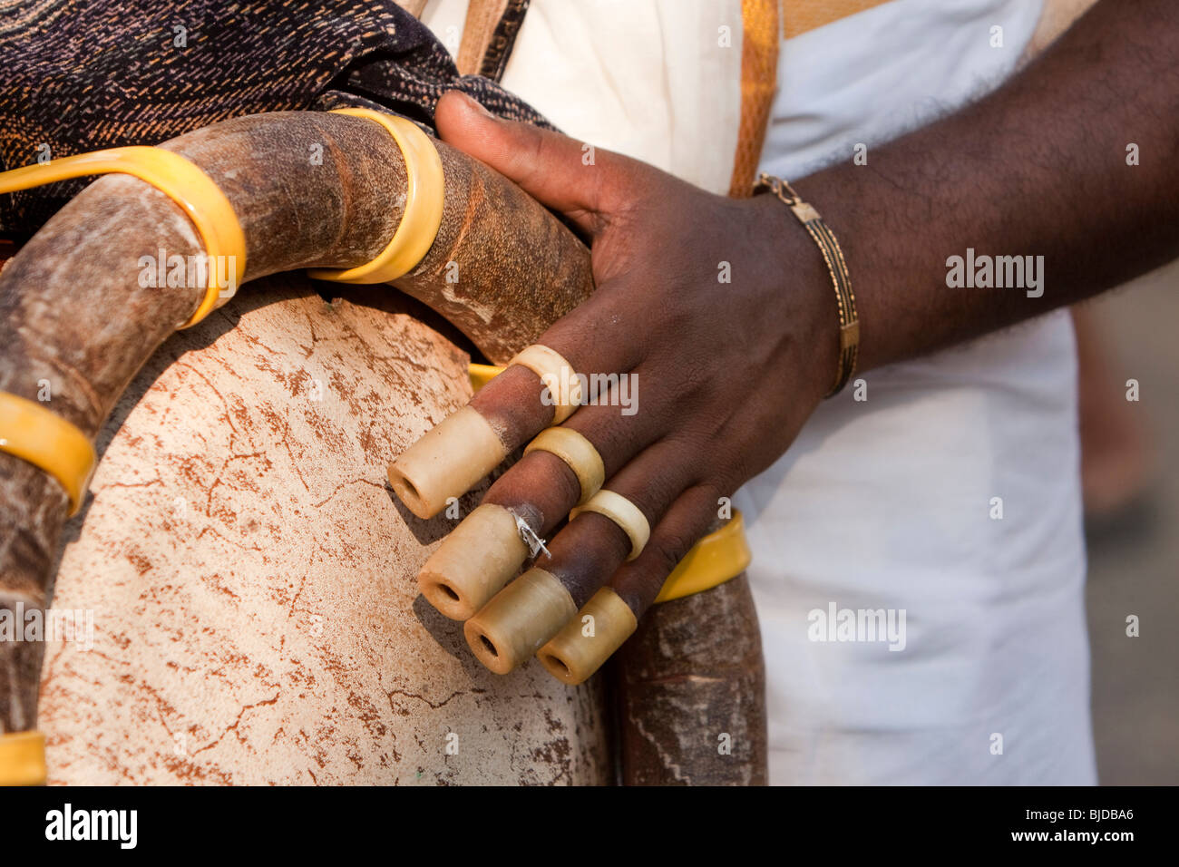 India, Kerala, Kochi, Ernakulam Uthsavom festival, hand and fingers of Madallam drummer Stock Photo