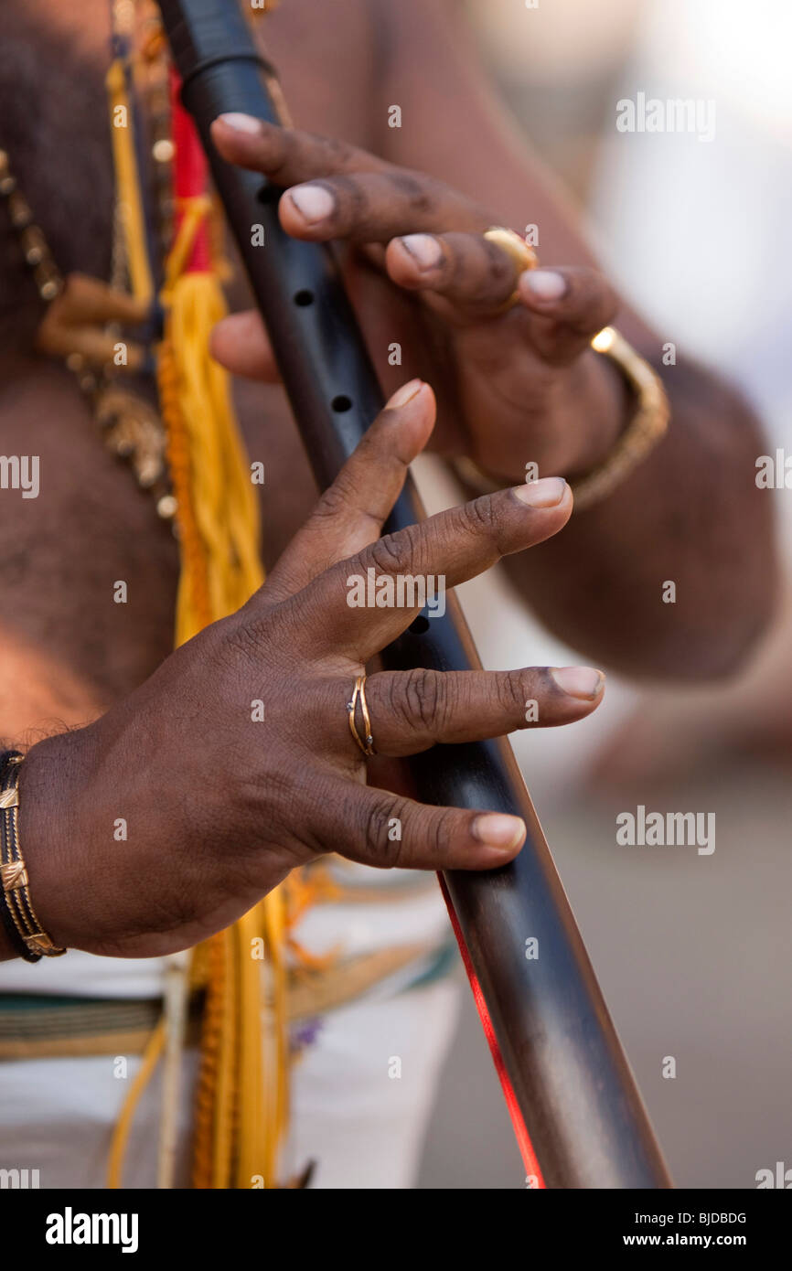 India, Kerala, Kochi, Ernakulam Uthsavom festival, hands of Nadaswaram trumpet player Stock Photo