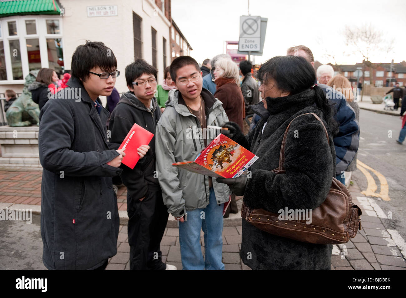 Chinese tourists asking for directions Liverpool UK Stock Photo
