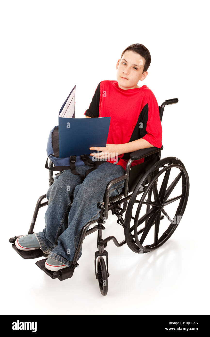 Disabled schoolboy in his wheelchair. Full body isolated. Stock Photo