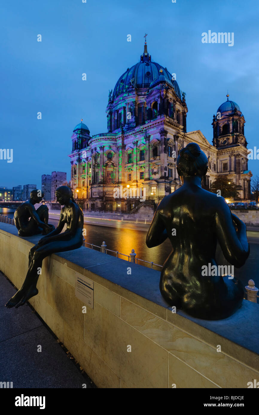 Sculpture 'Drei Maedchen und ein Knabe' in front of the Berlin Cathedral during the Festival of Lights 2008 in Berlin, Germany Stock Photo