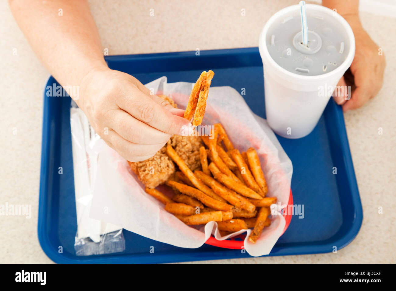 Fast food meal of chicken nuggets and fries with a soda Stock Photo Alamy