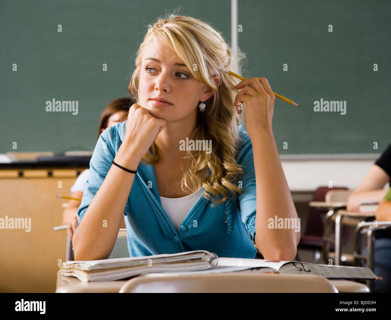 Student in a classroom Stock Photo - Alamy