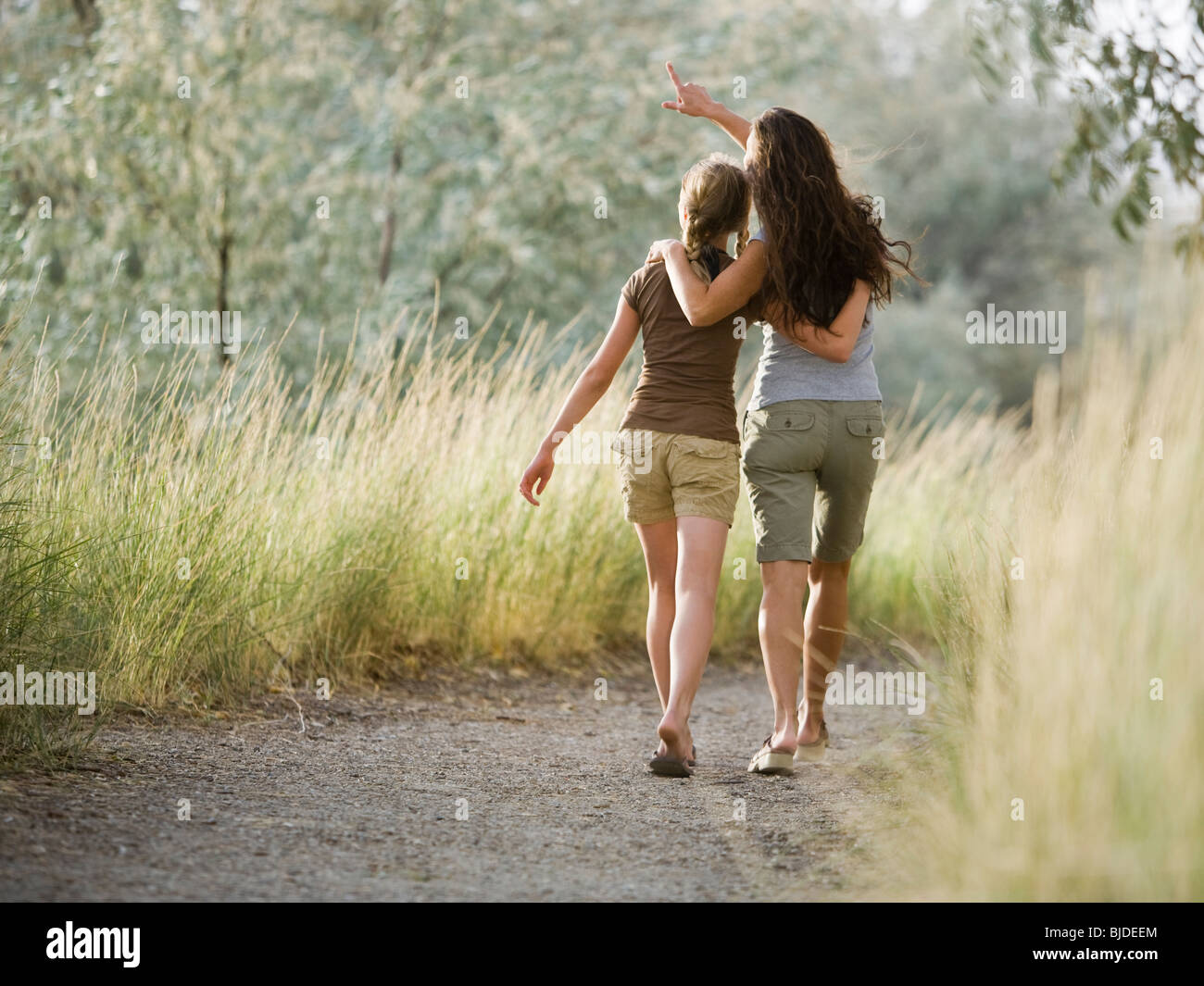 Two women on a nature walk. Stock Photo