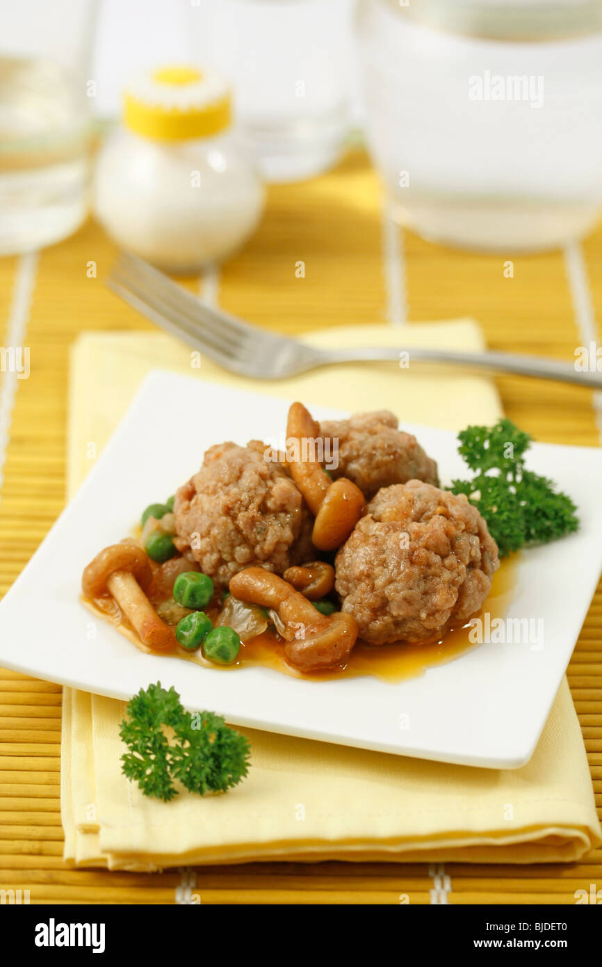 Meatballs with mushrooms. Recipe available. Stock Photo