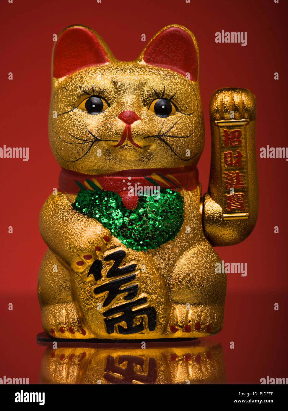 Golden asian cat toy. Stock Photo