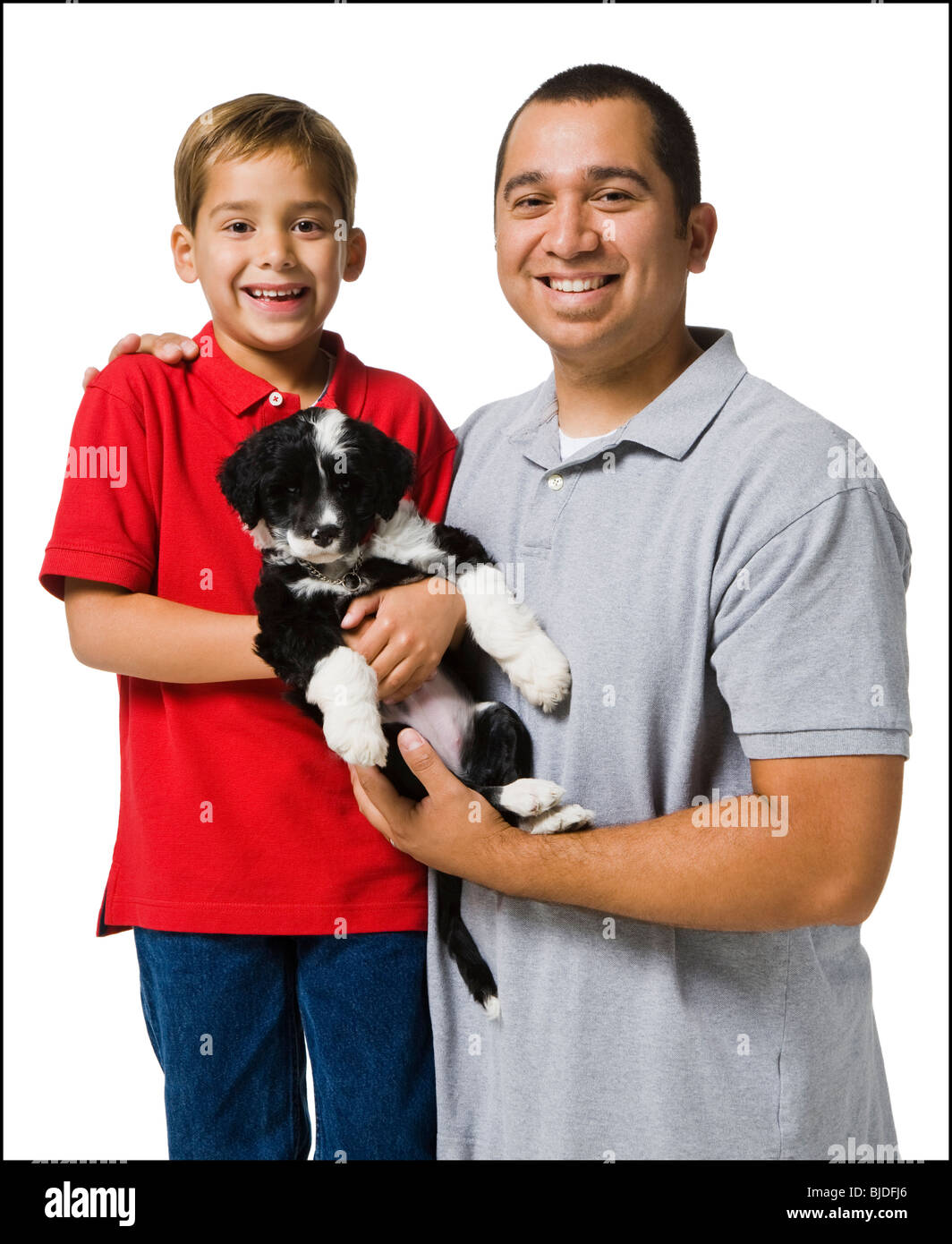 father, son and puppy Stock Photo Alamy