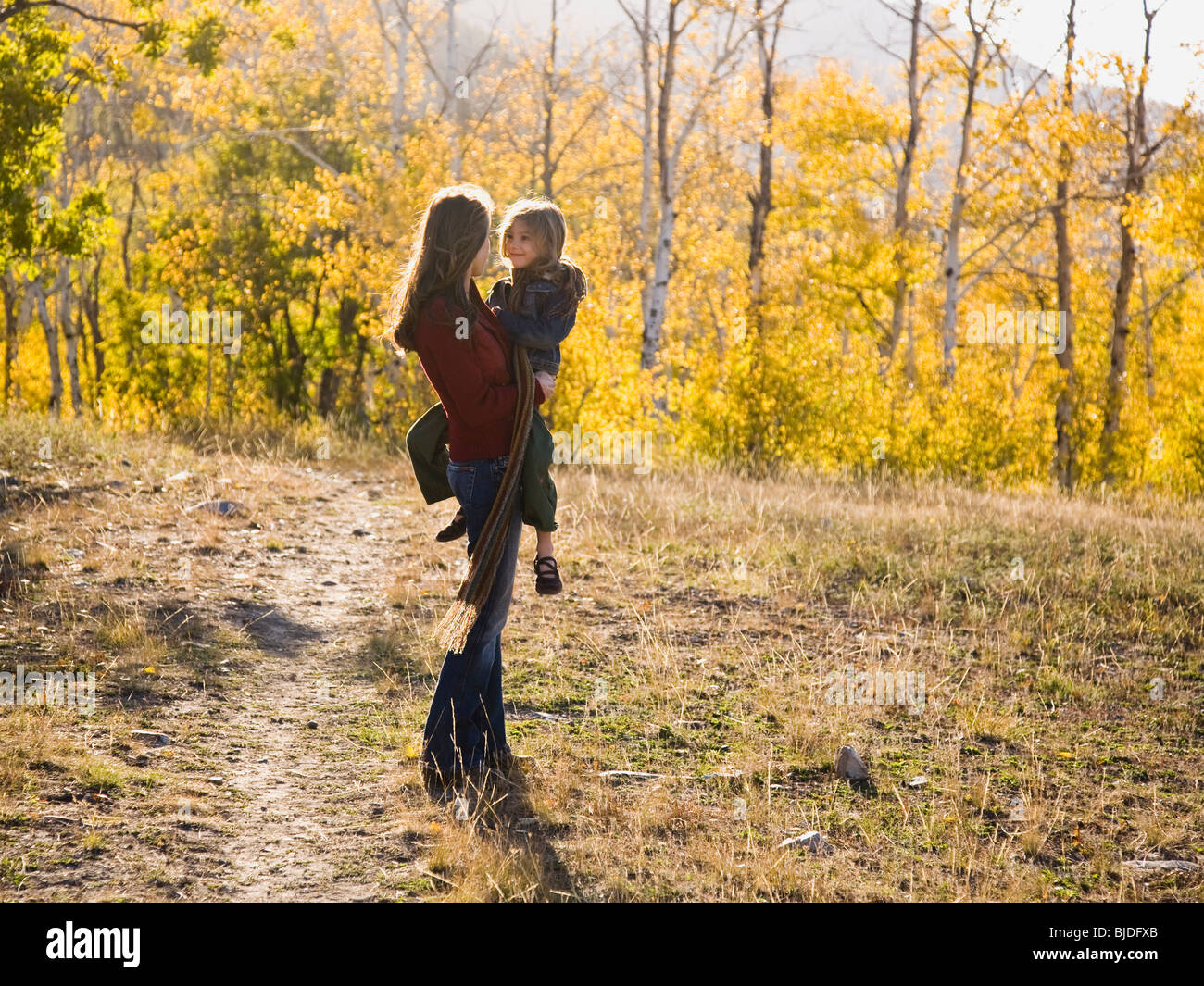 mother and daughter outside. Stock Photo