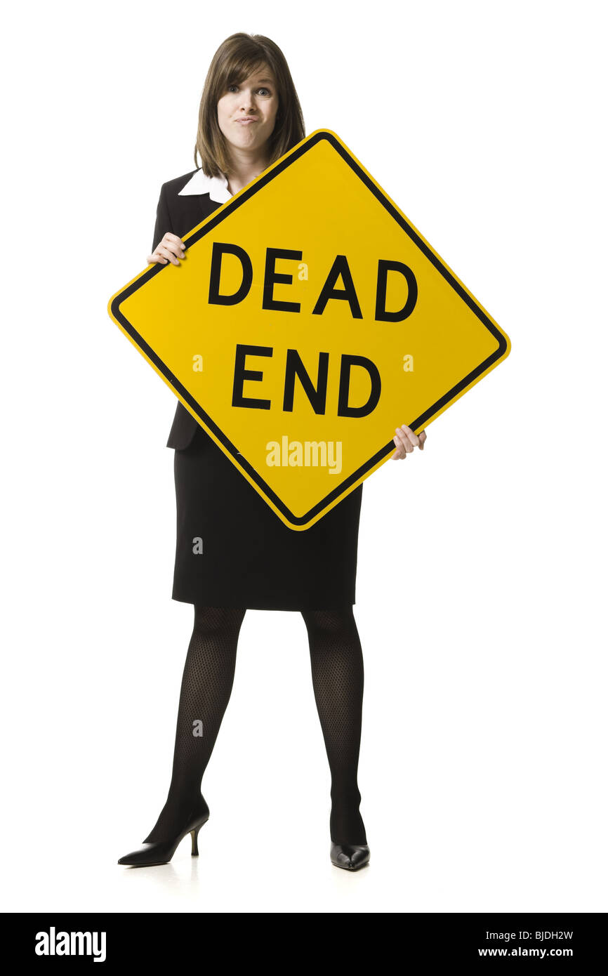 person holding a dead end sign Stock Photo