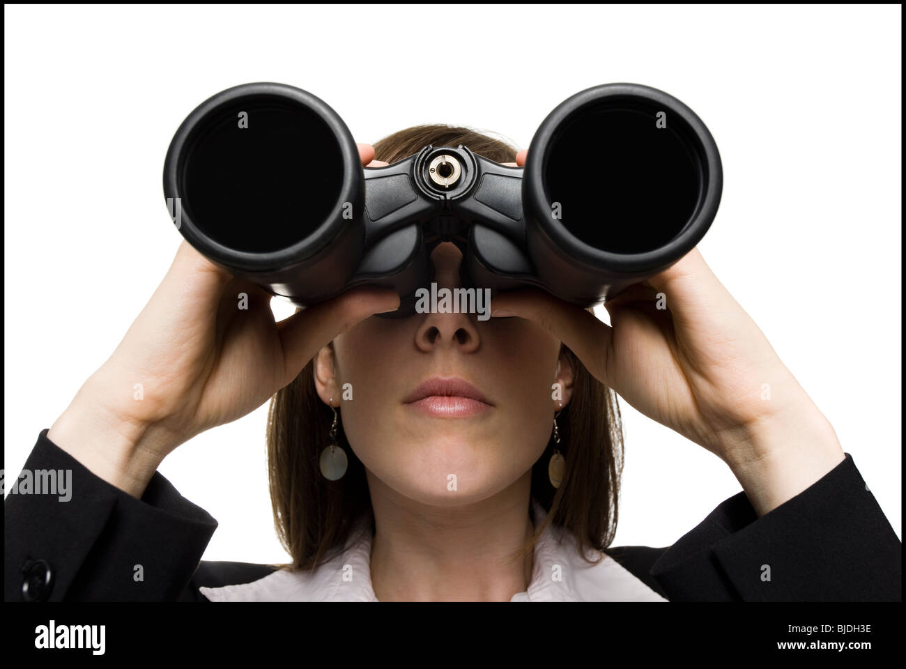 businessperson with binoculars Stock Photo