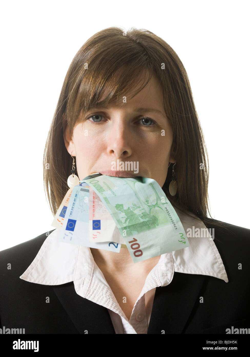 businessperson with a mouth full of money Stock Photo