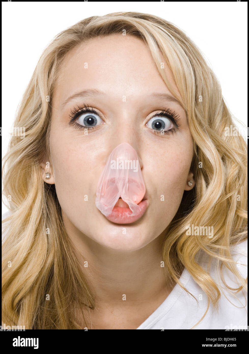 young woman chewing bubble gum Stock Photo