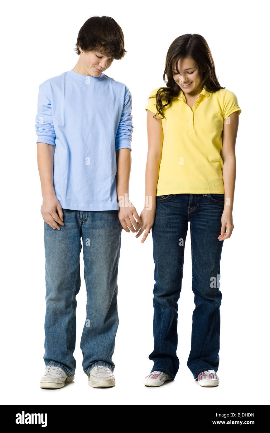 young couple holding hands Stock Photo - Alamy