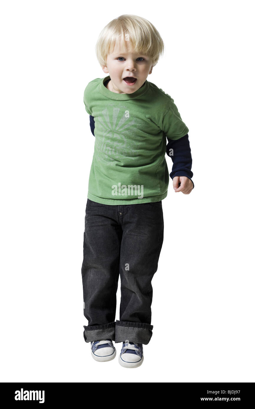 little boy in a green shirt Stock Photo Alamy