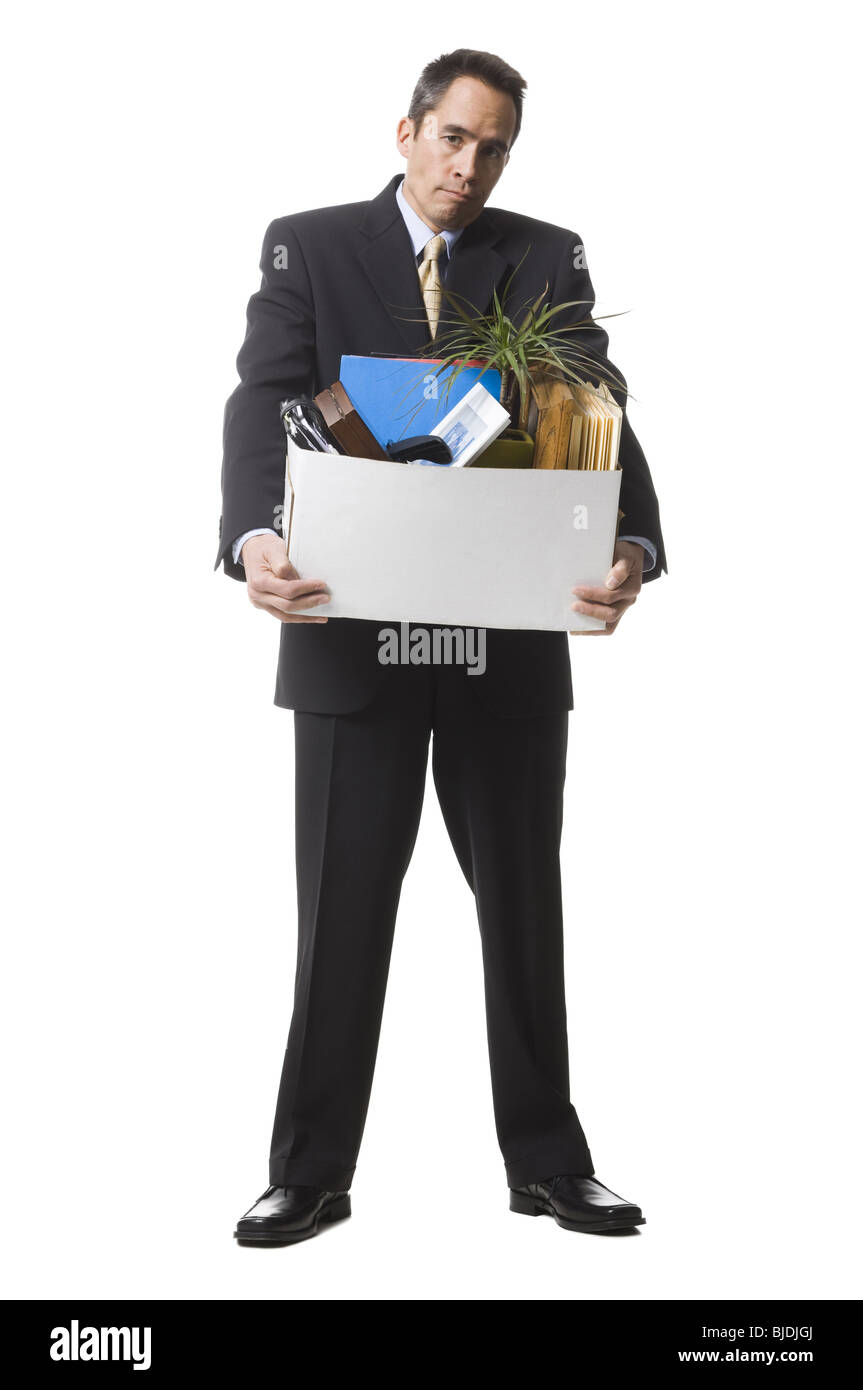businessperson clearing out things Stock Photo