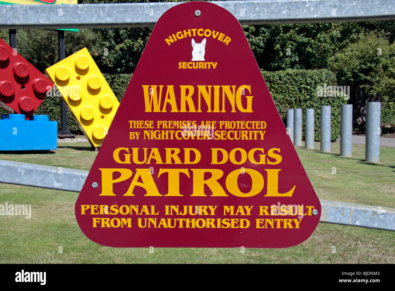 A Guard Dog Patrol warning sign at the Legoland Park near Windsor, UK. Stock Photo