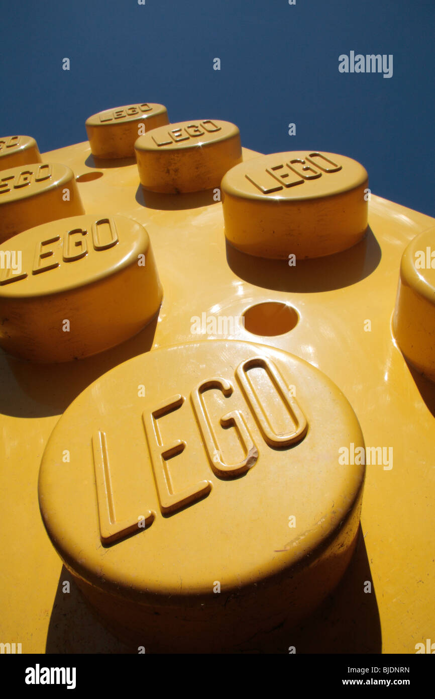Close up of the Lego branding on giant red, yellow & blue Lego blocks  outside Legoland, Windsor, UK Stock Photo - Alamy